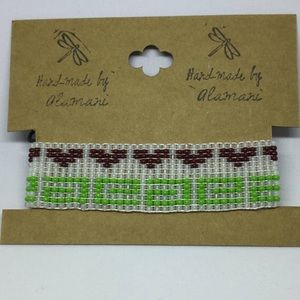 Handmade beaded bracelet "White, green, burgundy”